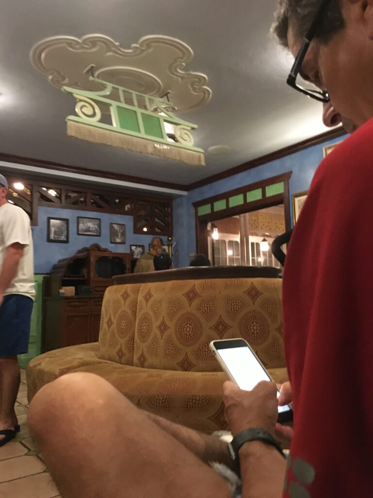 man writing on iPhone at Skipper Canteen