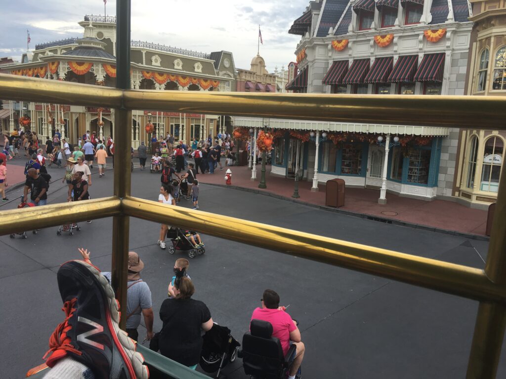 view of Town Square from Magic Kingdom double-decker bus