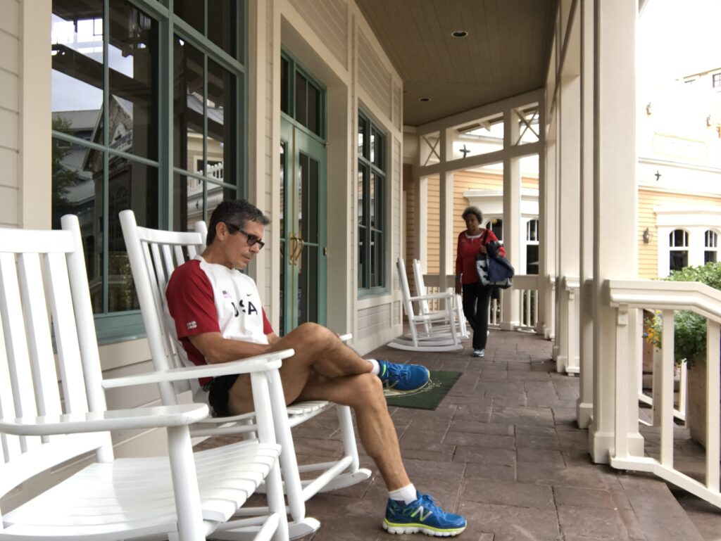 man sitting on rocking chair at Disney