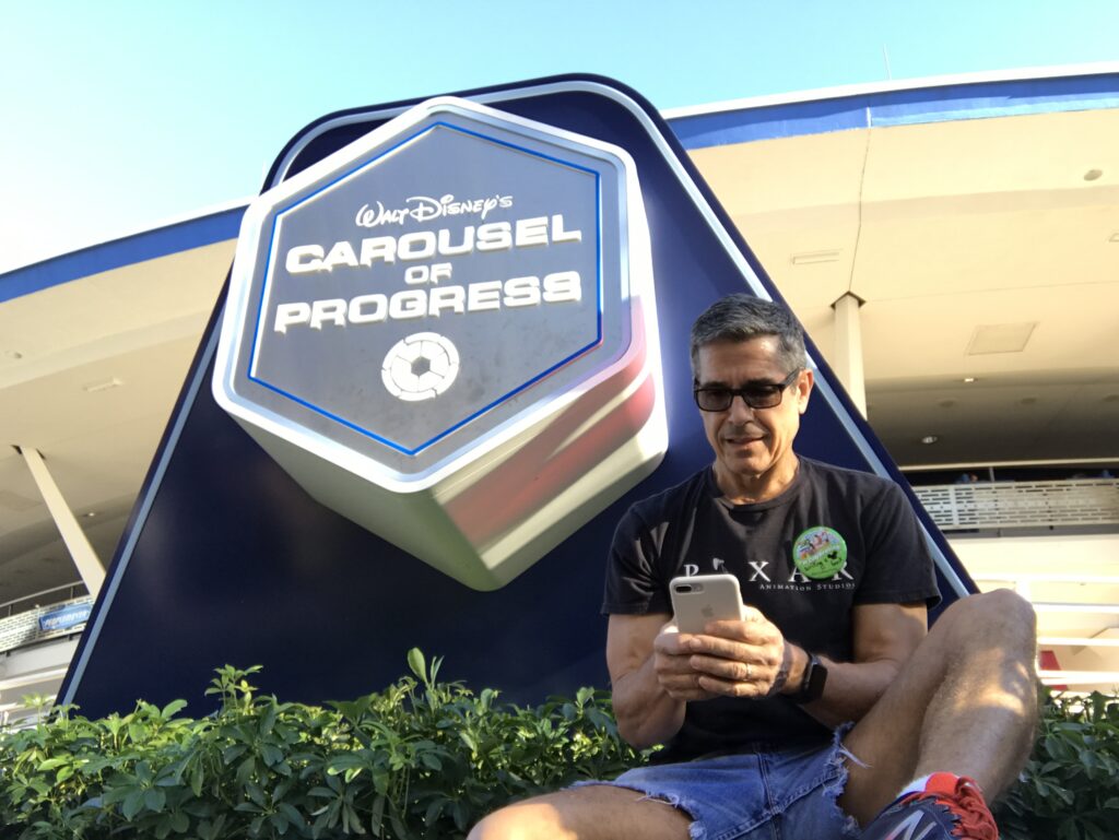 Disney author Jeff Noel on iPhone at Carousel of Progress